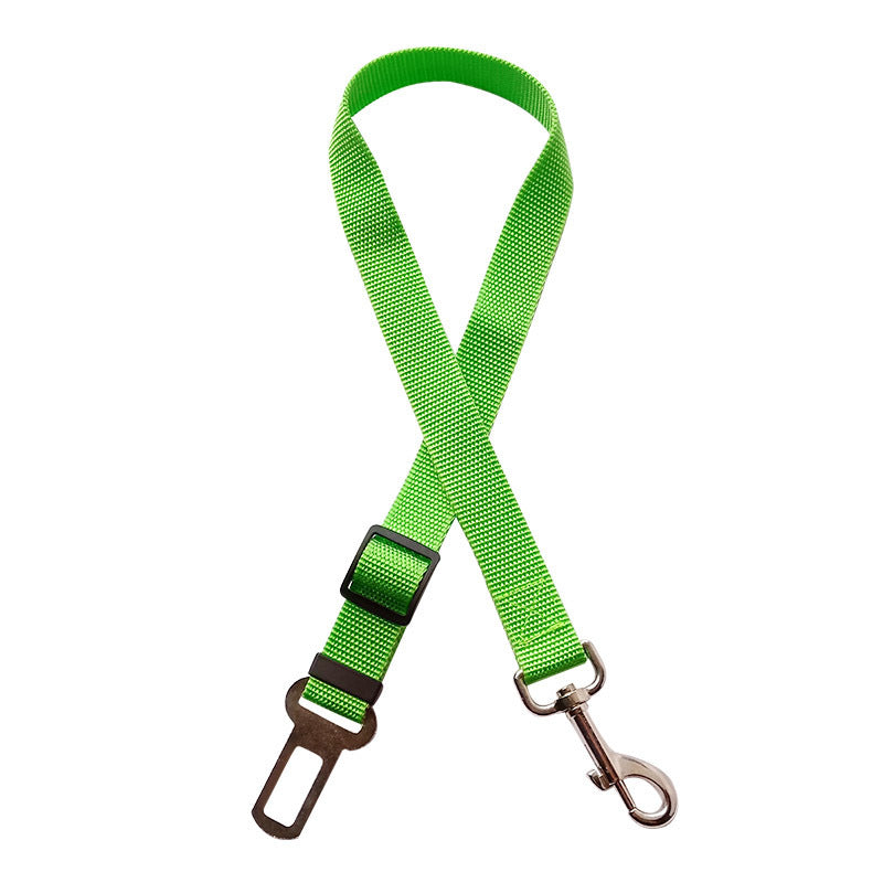 Cinturón de sujeción ajustable para perro en coche en color verde, con mosquetón metálico y clip para hebilla del cinturón.