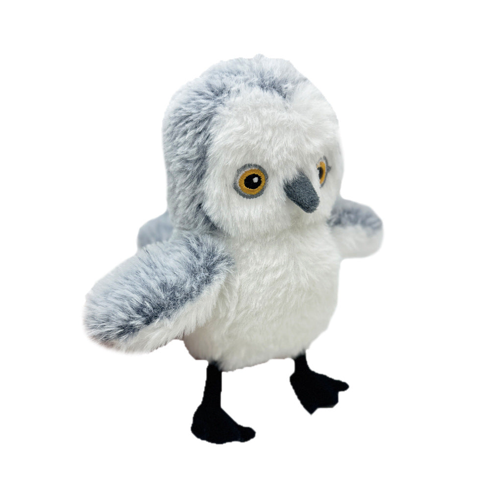 Búho gris FlapBird con las alas abiertas