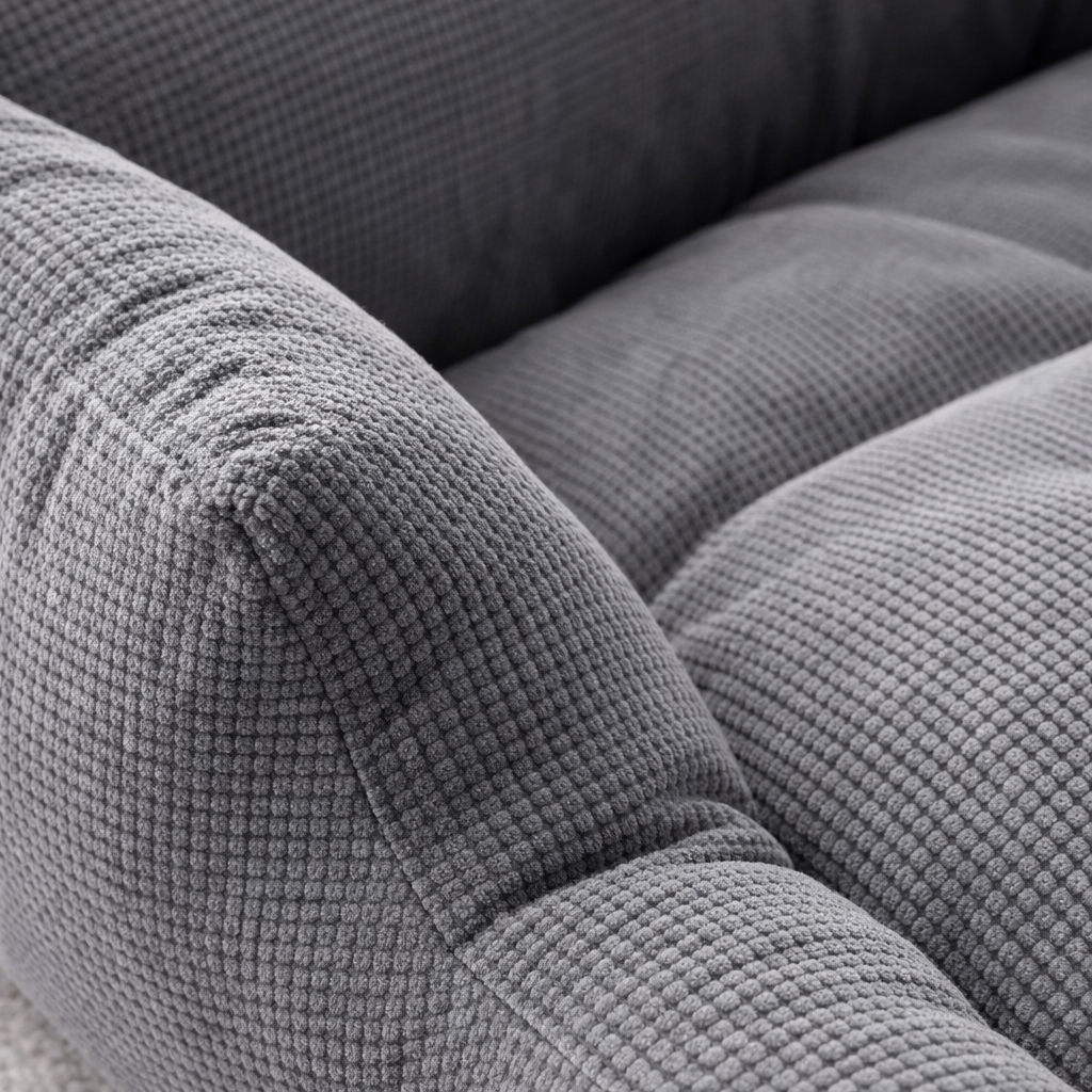 Detalle del tejido y acolchado de la cama para perro NestWarm Bed (gris)